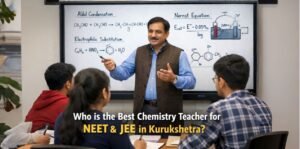 Experienced chemistry teacher explaining concepts on a whiteboard to attentive students in a classroom for NEET & JEE in Kurukshetra, creating an engaging learning environment.